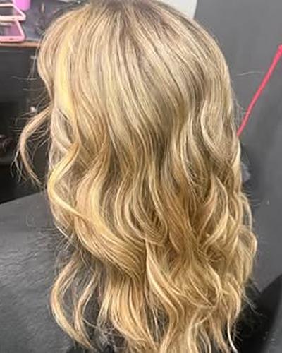 Golden blonde waves, seen from the back