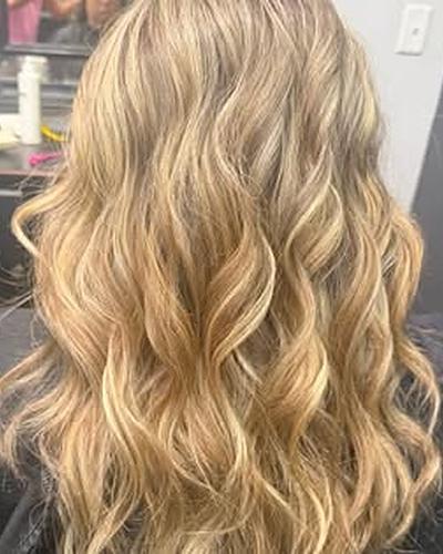 Warm blonde waves, seen from the back