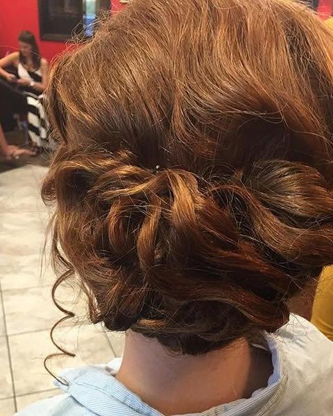 A curly up do, seen from behind