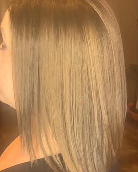 A sleek blonde lob
